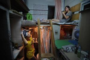 Appartamenti capsula in Cina, o il modo di sopravvivere in una scatola da sotto il frigorifero